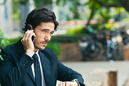 Businessman talking on his smart phone