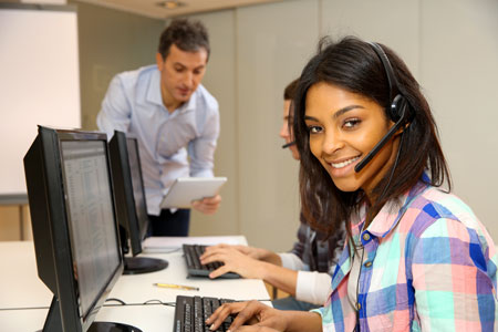 Female student wearing a headset.
